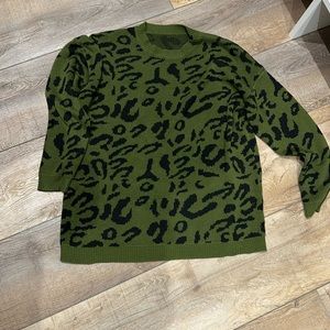 Long sleeve green, and black leopard print sweater.